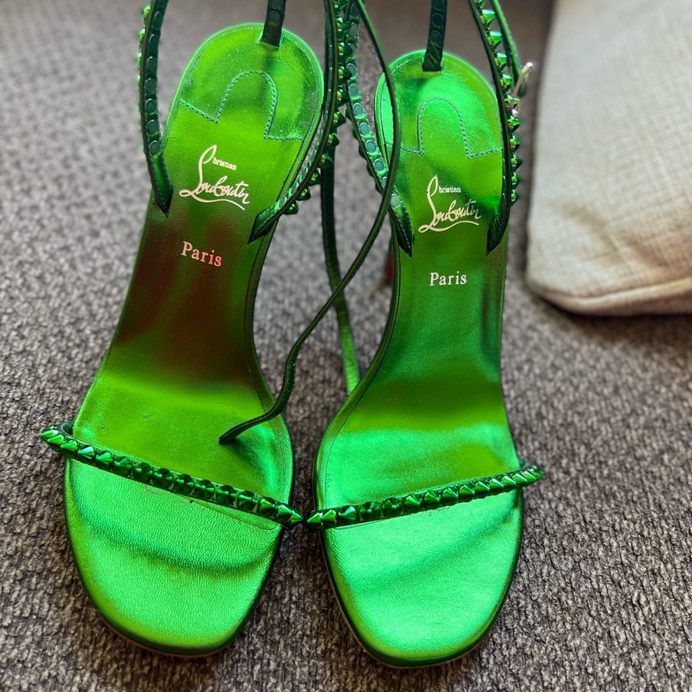 Worn once Christian Louboutin scrappy heels with everything shown in pictures.